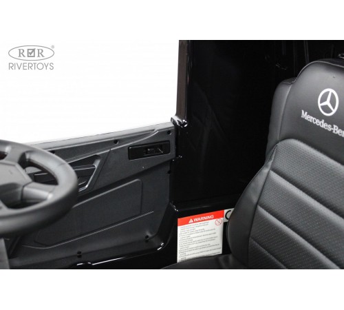 Детский электромобиль Mercedes-Benz Actros HL358 черный глянец