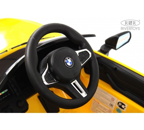 Детский электромобиль BMW M4 (A004AA) желтый Детский электромобиль BMW M4 (A004AA) желтый